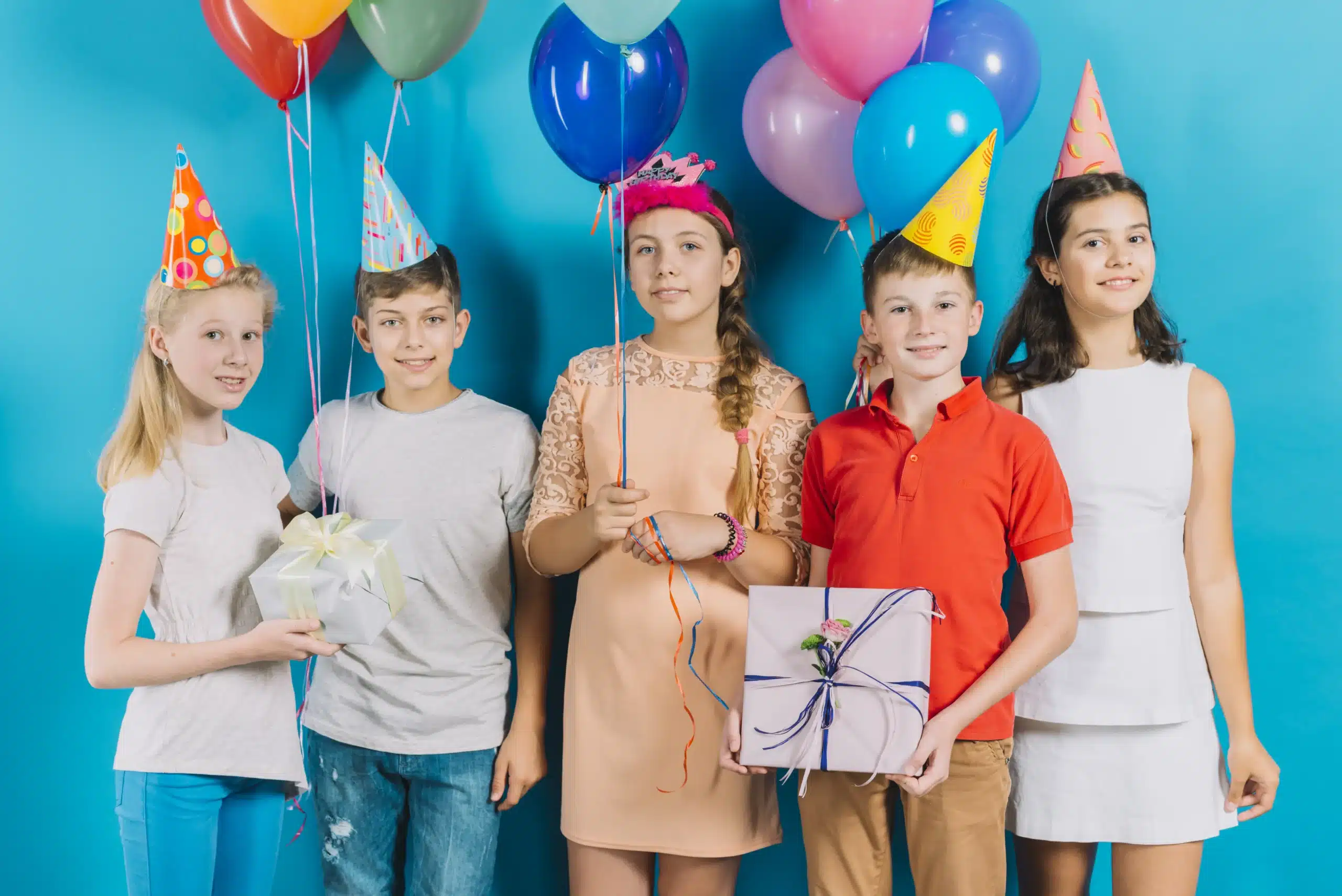 group friends with gifts colorful balloons blue background ezgif.com jpg to webp converter 1 1 scaled 1